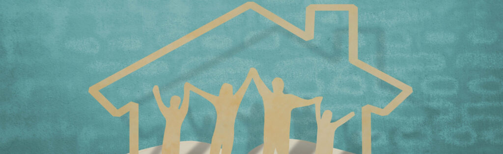 Paper cut out of happy family in front of a house